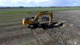 Diep spitten met Caterpillar rupskraan