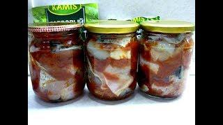 Homemade canned fish in tomato for long-term storage at home. Video recipe