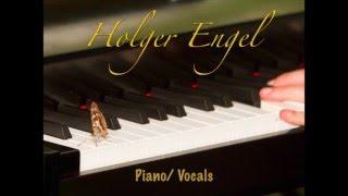 Holger Engel singt am Piano