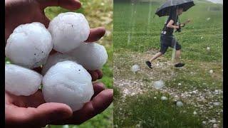 Mann rennt in HAGELUNWETTER - Monsterhagel 7cm in Bayern  Unwetter schmeißt Tennisball Hagel