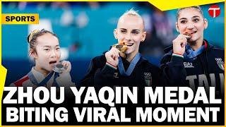 Zhou Yaqin Chinese gymnast adorable metal-biting moment goes viral at Paris Olympics 2024