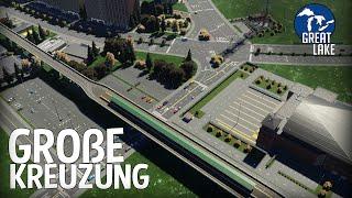 Große Kreuzung an der erhöhten U-Bahn Station in Cities Skylines 2  Great Lake 110