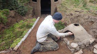 dugout shelter bushcraft ireland clay pizza oven