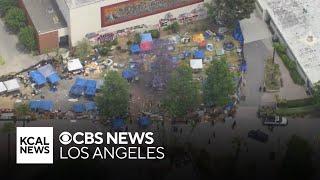 Police move in to dismantle protester encampment on CSULA campus