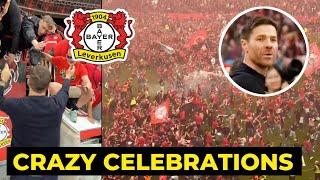 Xabi Alonso and Leverkusen celebrating Bundesliga title win