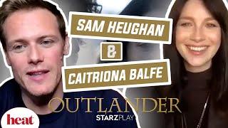 ‘They Can’t Keep Their Hands Off Each Other’ Sam Heughan & Caitriona Balfe React To Outlander