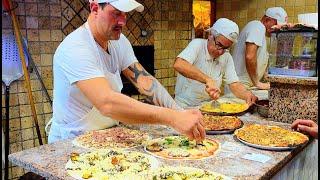 Maestri della PIZZA ROMANA tradizionale in questa Storica Pizzeria nel quartiere Testaccio a Roma