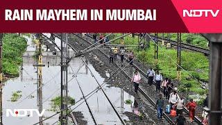 Latest News About Rain In Mumbai  Heavy Rain In Mumbai Grounds Flights Shuts Schools