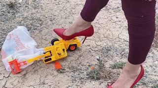 Sadaf Crushing Toys under her Car  Crushing things with Her High Heels