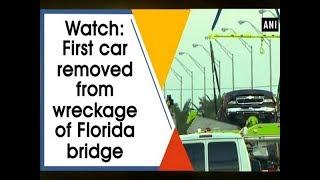 Watch First car removed from wreckage of Florida bridge - USA News