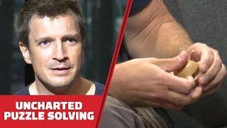 Nathan Fillion Solves Wood Puzzles While Telling Us Why He Loves Uncharted - Comic Con 2018