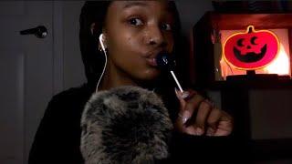 ASMR eating a lollipop  mouth sounds + semi-inaudible whispering