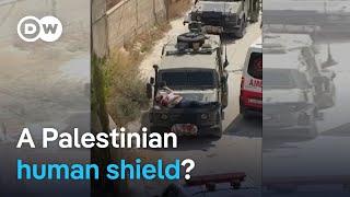 Israeli troops strap man to hood of jeep during West Bank raid  DW News
