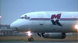 DOUGLAS DC-8-62   3D-OZV  and  9G-MKH  twilight   Ostend Airport 2001