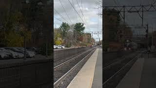 NJT 877 passing MillburnNJ with Metro North 4906 leading