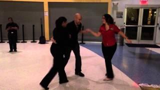 Dancing Salsa with Two Girls