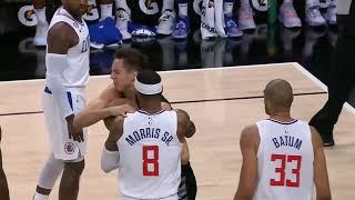 Marcus Morris Sr hits Zach Collins around the neck then they get into it