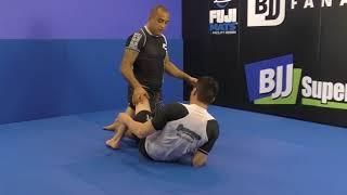 Double Over Pass From Half Guard by Yuri Simoes