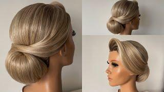 Wedding hairstyle. Smooth clean low bun.