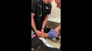 elbow dislocation - 2 person technique