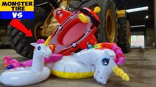 Crushing Giant Inflatables with Monster Tire  Unicorn Family