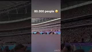 KSI gets 80.000 people to sing holiday