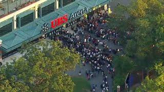 Crowds gather outside of UBS Arena ahead of Dalai Lama visit