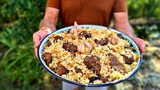 UZBEK PLOV from mutton in a cauldron.