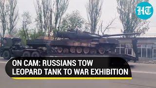 Putins Men Flaunt German Leopard Tank Seized In Ukraine At Russian War Trophy Exhibition  Watch