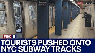 Tourists pushed onto NYC subway tracks