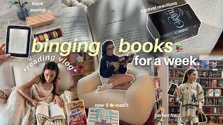 *reading vlog* binging books for a week starting a reading journal caraval reactions barnes haul