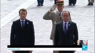 France François Hollande guides president-elect Emmanuel Macron through VE Day ceremony