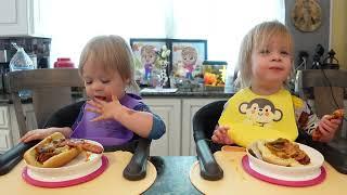 Twins try chili cheese dog