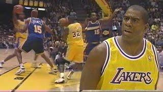 Magic Johnson gives Latrell Sprewell a monster ball fake in his return to the NBA