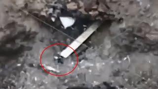 Russian Infantry Try Push Away Drone With Stick But Detonates It Instead