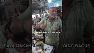 Millionaire eats in local street food market