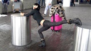 Bai Ling Strikes A Series Of BIZARRE Poses At LAX