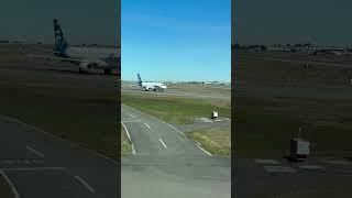 Boeing B777 taking off runway 16L Seattle Tacoma airport