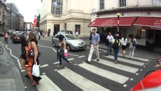 Cyclists ignoring pedestrians at zebra crossing