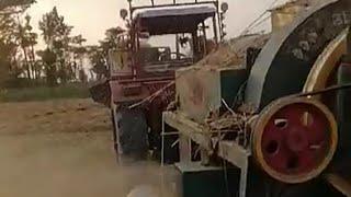 Wheat threshing machine Wheat is used in thousands of foods around the world..آلة دراس القمح.