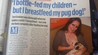 Woman Breastfeeds Her Dog