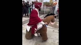 Groom showed up to the venue riding on a motorised horse toy