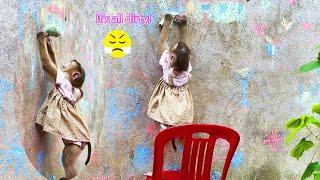 Monkey Lyly was angry when Dung drew on the wall so she took a towel to clean it up