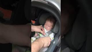 Safely buckle baby in a car seat @breastfeedingfixers