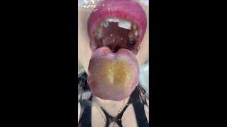 Blondie girl is licking the glass with big tongue POV