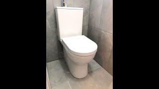 Rimless toilet installation back to wall