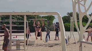 Walking through Muscle Beach in South Beach Miami 