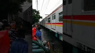 dramatic rainy season on railroad crossing train japan in Indonesia