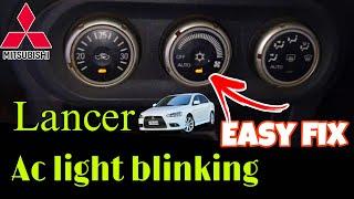 Mitsubishi lancer AC light blinking easy fix.