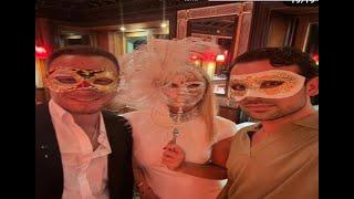 Hande Erçel and Kerem Bursin hiding behind masks at the masked ball